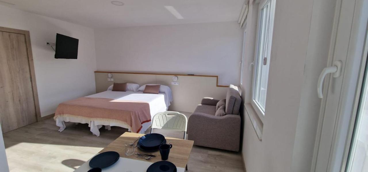 Estudios En Plaza Cabo Da Vila Centro ムシア エクステリア 写真