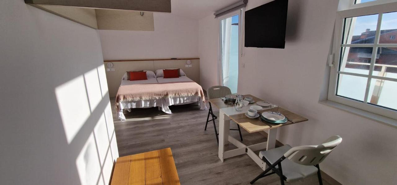 Estudios En Plaza Cabo Da Vila Centro ムシア エクステリア 写真
