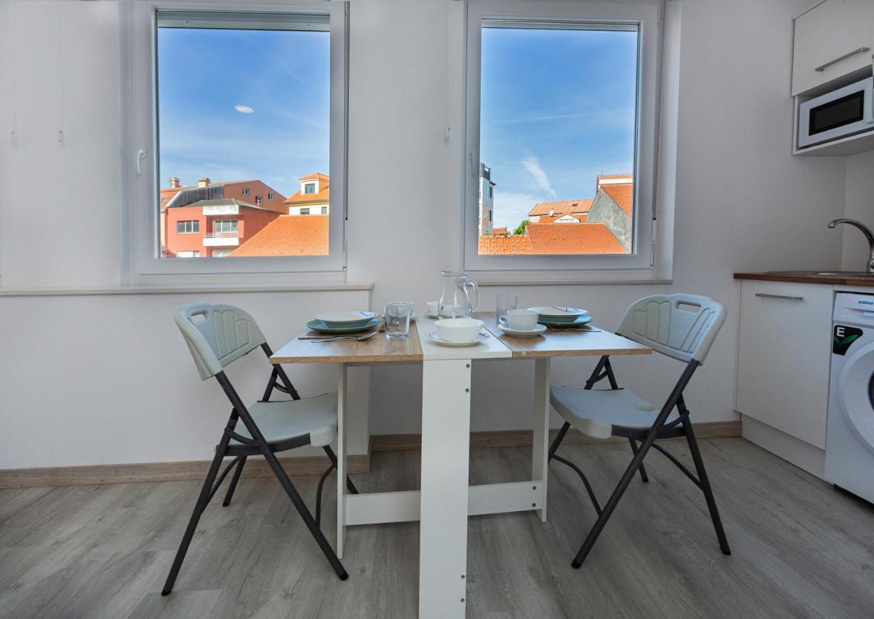Estudios En Plaza Cabo Da Vila Centro ムシア エクステリア 写真