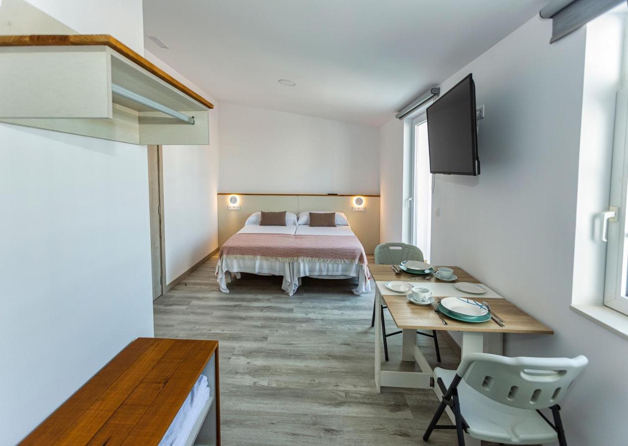 Estudios En Plaza Cabo Da Vila Centro ムシア エクステリア 写真